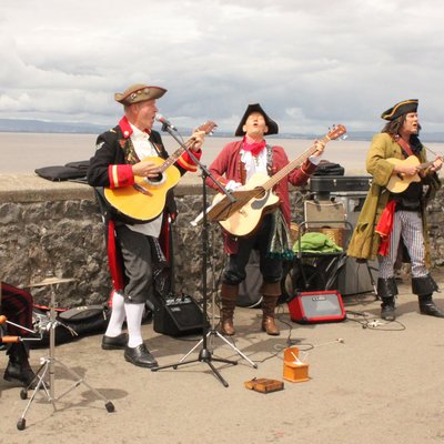 Piratitude Gallery Image. -  Piratitude pirate band busking in Clevedon