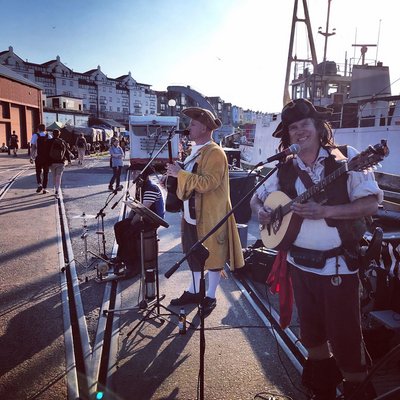 Piratitude Gallery Image. -  Pirate Band busking on Bristol's Harbourside Saturday evening 24th April 2021