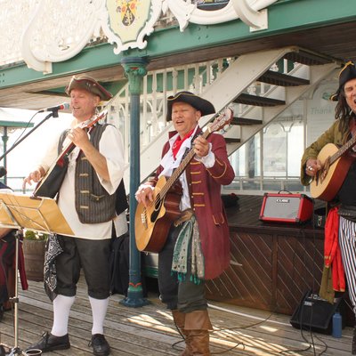 Piratitude Gallery Image. -  Pirate band busking at the end of Clevedon Pier